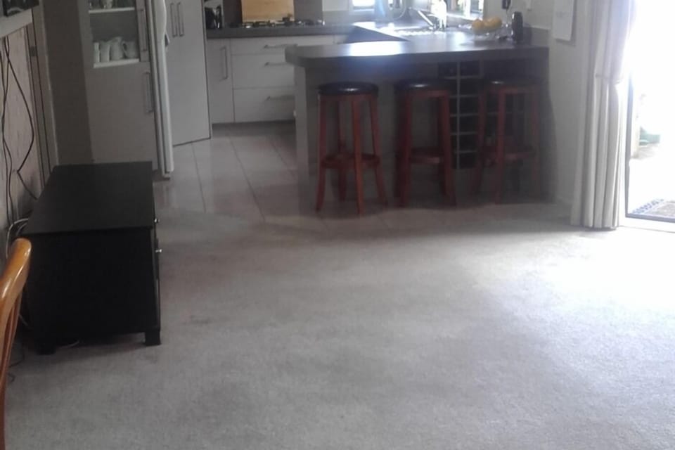 view of kitchen from open plan dining lounge area