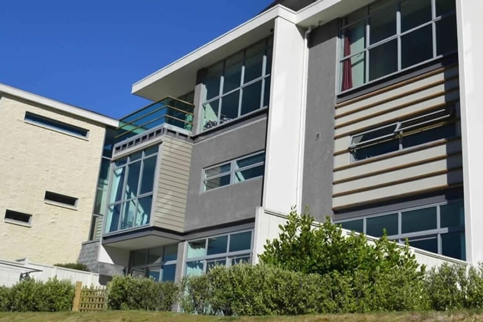 The apartment as viewed from the riverbank