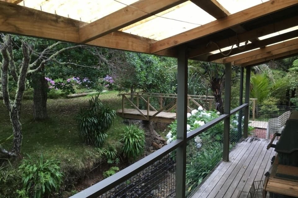 Cottage deck overlooking stream
