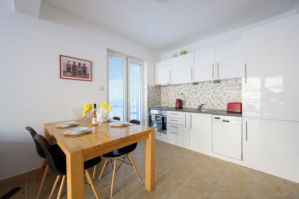 Kitchen with second balcony overlooking the bay