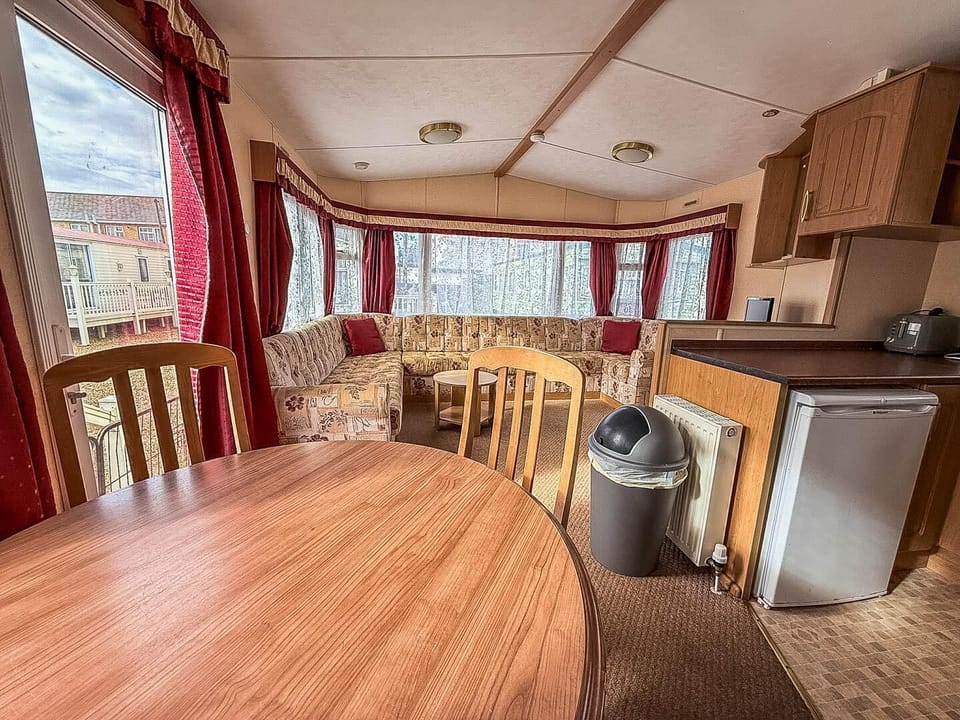 Cozy dining and lounge area with panoramic windows