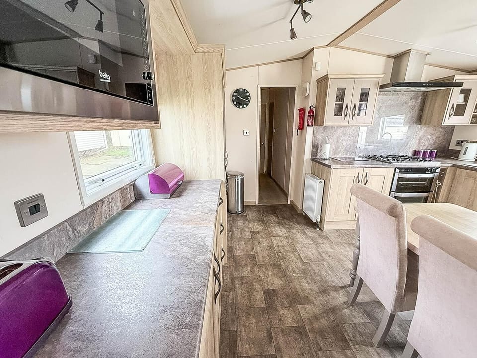This lodge kitchen offers space for preparing everything from a quick breakfast before hitting the beach to a full family dinner.