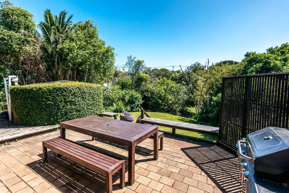 Back patio, garden and BBQ.