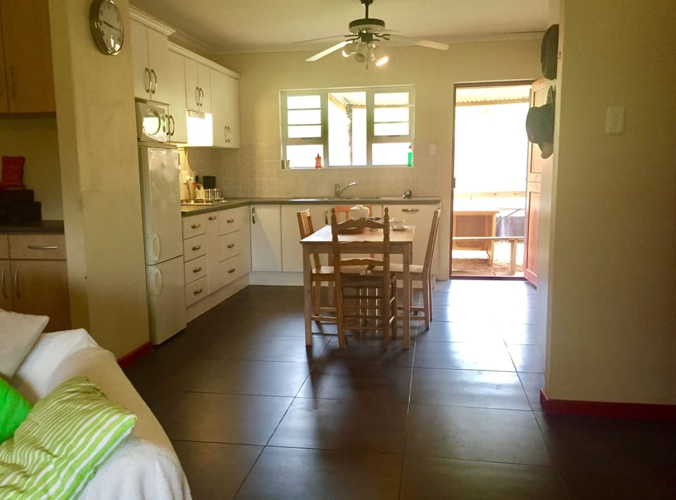 The open plan kitchen/diner area gives access to the garden