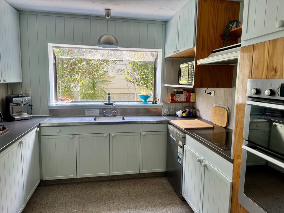 Kitchen on downstairs level - includes kettle, toaster, microwave, coffee maker