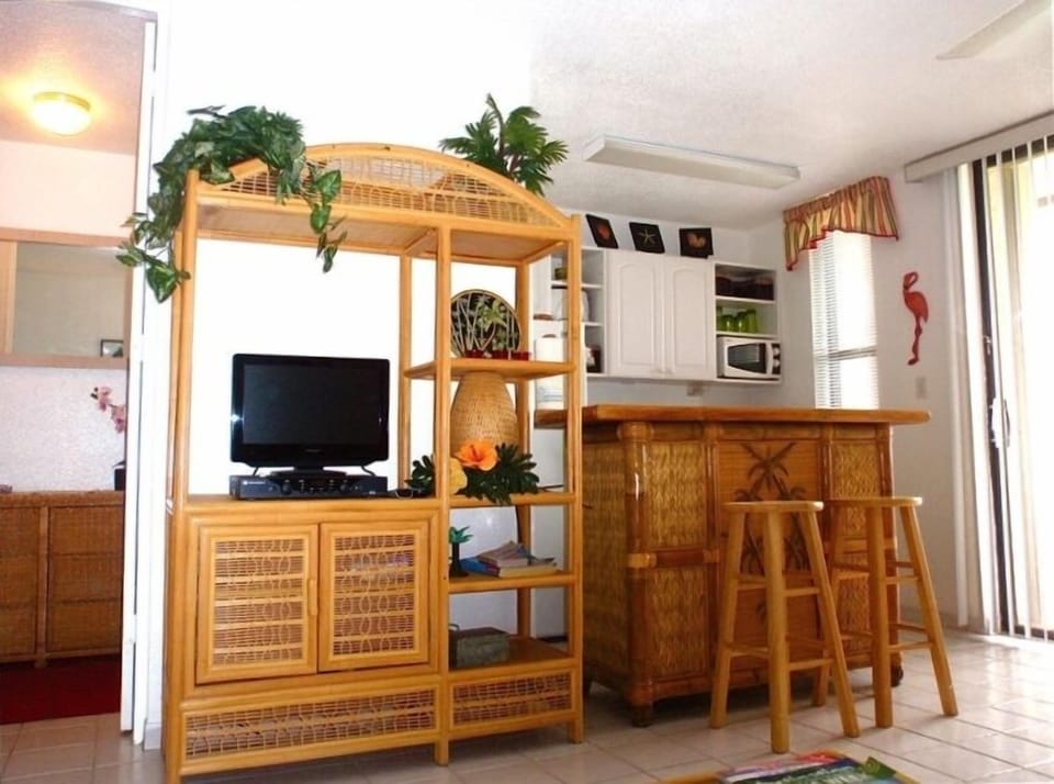 The Dressing Room, Entertainment Center, and Kitchen add to the Island Ambiance