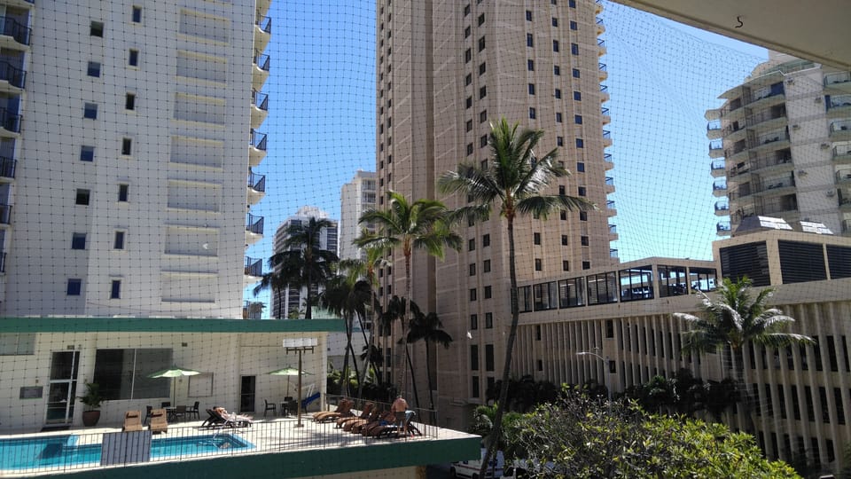 Nice view of neighboring hotel pool and palms, seen from the lanai