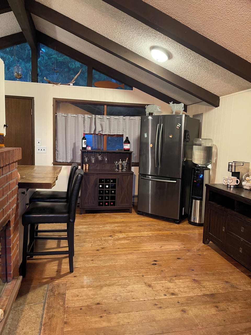 View of the kitchen from the dining room table
