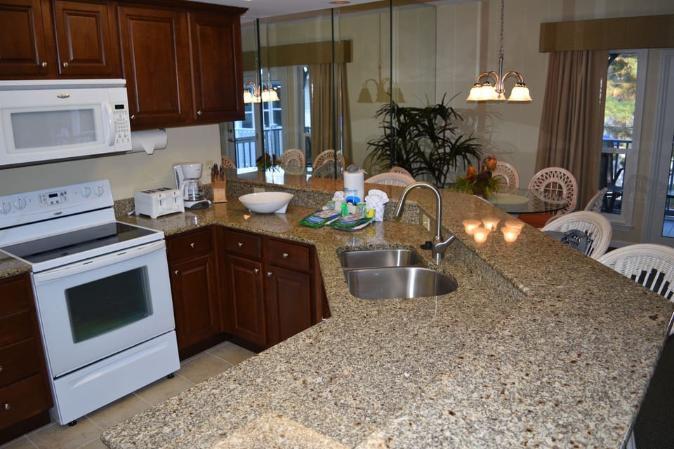 New granite tops and kitchen cabinets