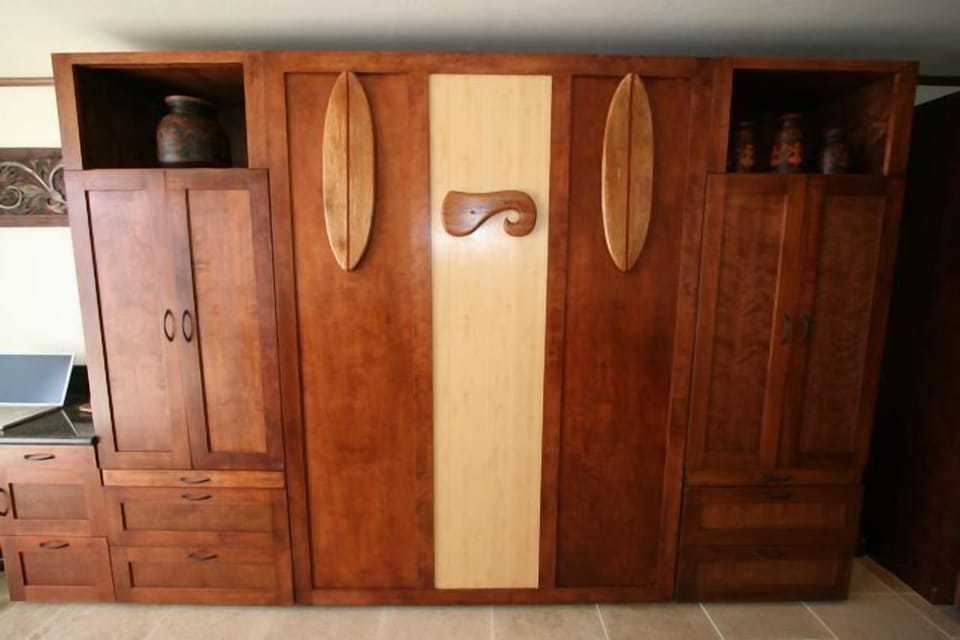 Custom Wall-Bed with surfboard legs.