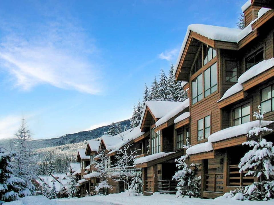 - Snow-covered mountain chalets with serene alpine scenery  
- Cozy retreat nestled among towering pines and fresh powder  
- Perfect winter escape near ski slopes and scenic trails  