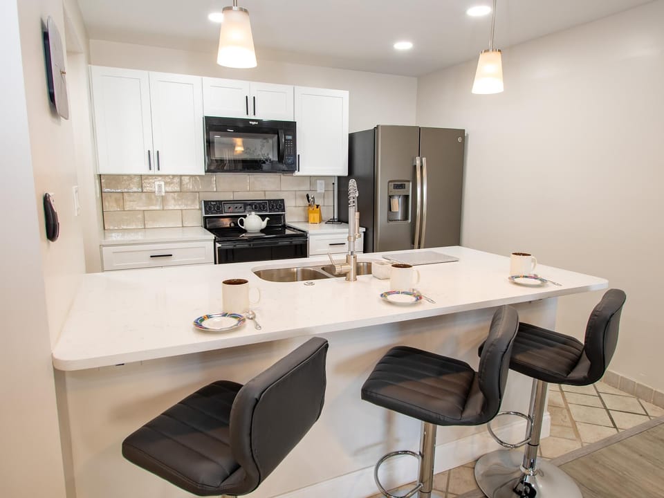 Three additional seats at the kitchen counter