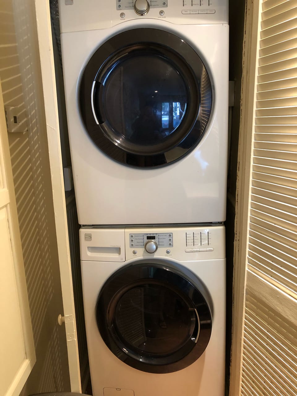 Full size front load Washer/Dryer, Fold-Out ironing board. Detergent included