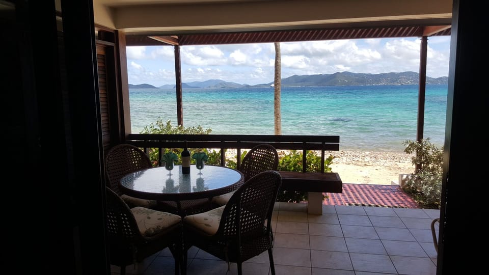 A glass of wine out on the patio checking out St John.