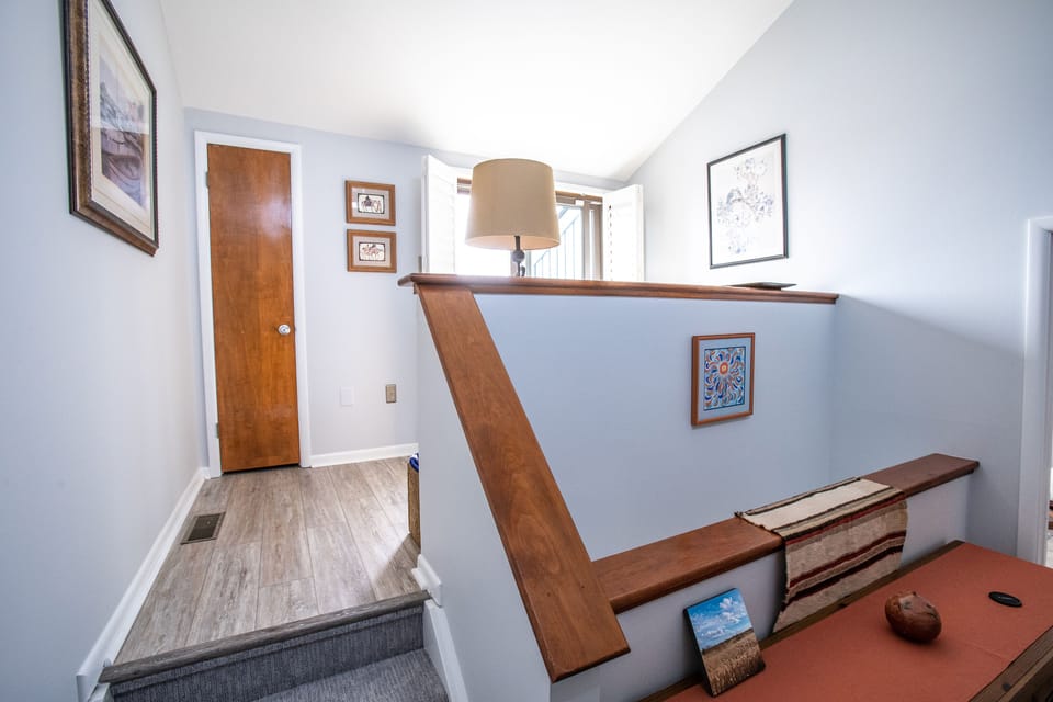 2nd fl landing with access to bedrooms, bath and reading nook