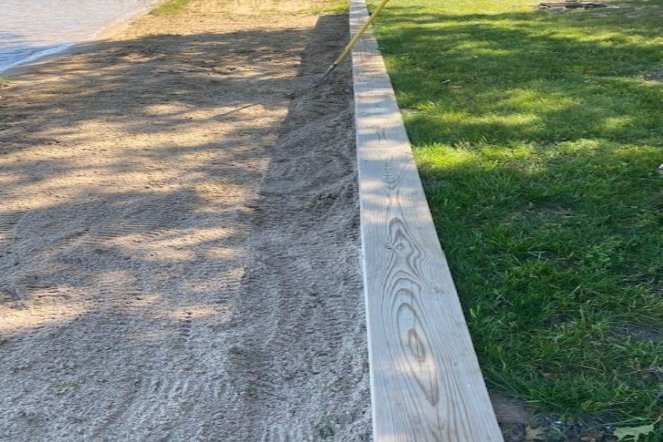 Short wall added in 2020 between beach and yard  area
