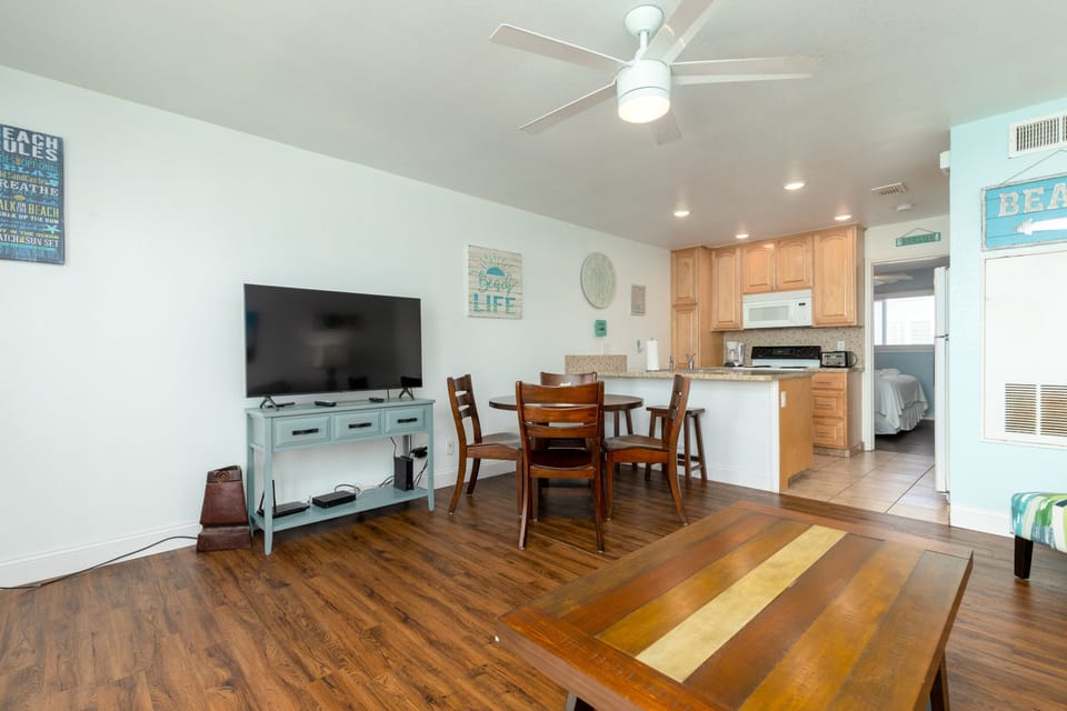 Inviting family hub with seamlessly integrated kitchen, dining, and living areas, perfect for creating lasting memories