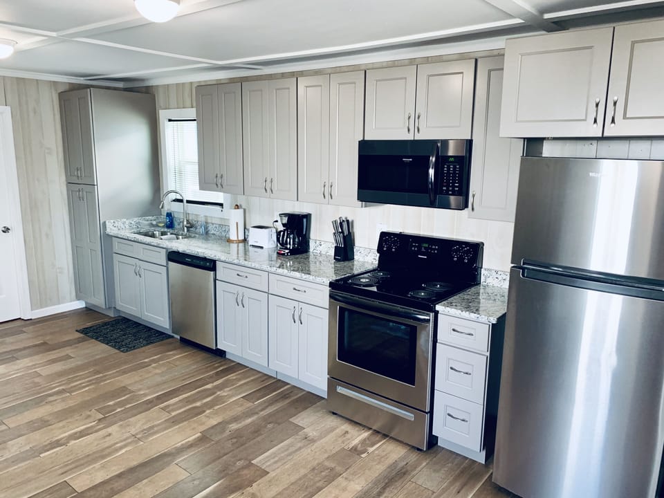 All new appliances, cabinets, floors and walls. 