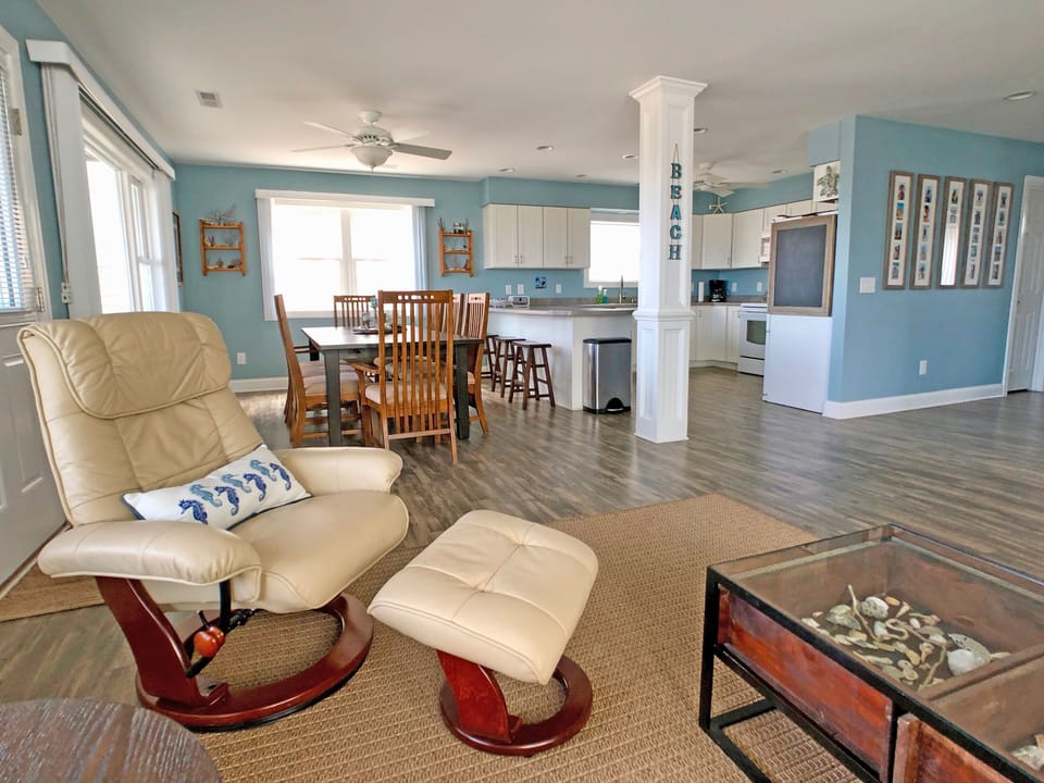 Open main floor - living room, dining and kitchen.