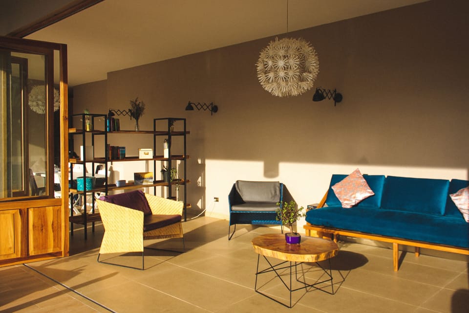 Main house, living room with books in different languages and table games