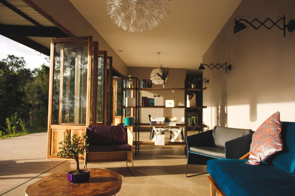 Main house, living room with books in different languages and table games