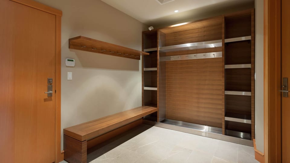 - Mudroom with built-in benches and organized shelving for ski gear  
- Spacious design to store coats, boots, and outdoor essentials  
- Functional entryway made for mountain adventures  