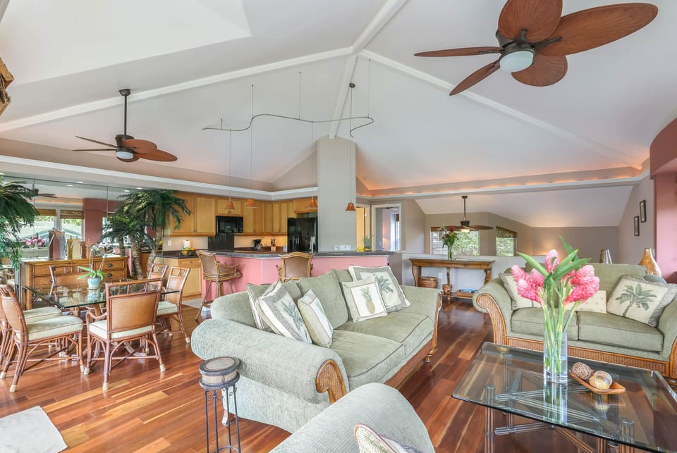 Relax in the cozy living area with plush seating and an open and inviting layout.