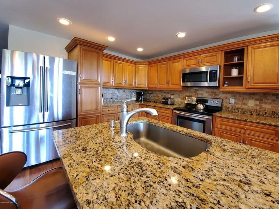 Fully stocked kitchen to cook and serve everyone. 2 refrigerators.