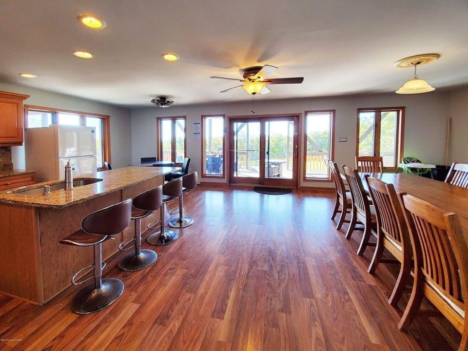 Large dining table and a round table for eat-in kitchen.