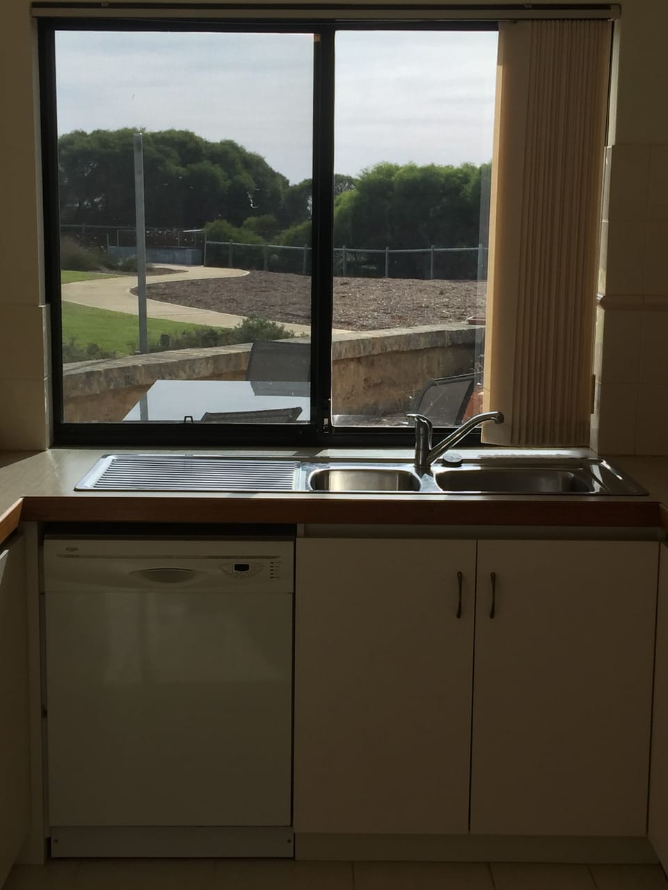 kitchen overlooks park court yard and ocean