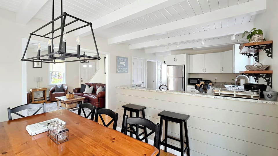 Dining area with kitchen beyond