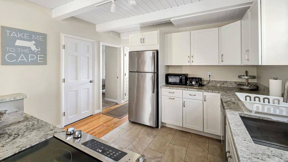Nicely equipped kitchen with stainless appliances