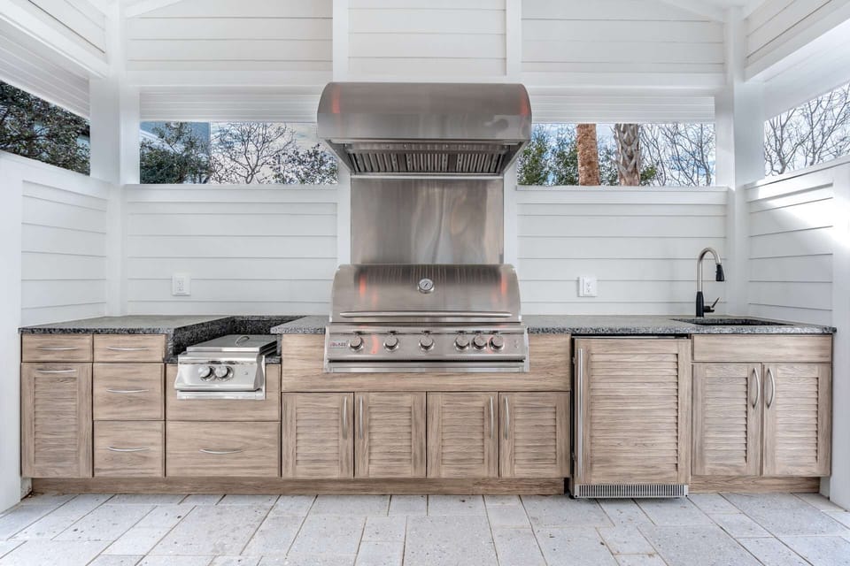 Fridge, stove, sink and grill to cook family dinners outback!