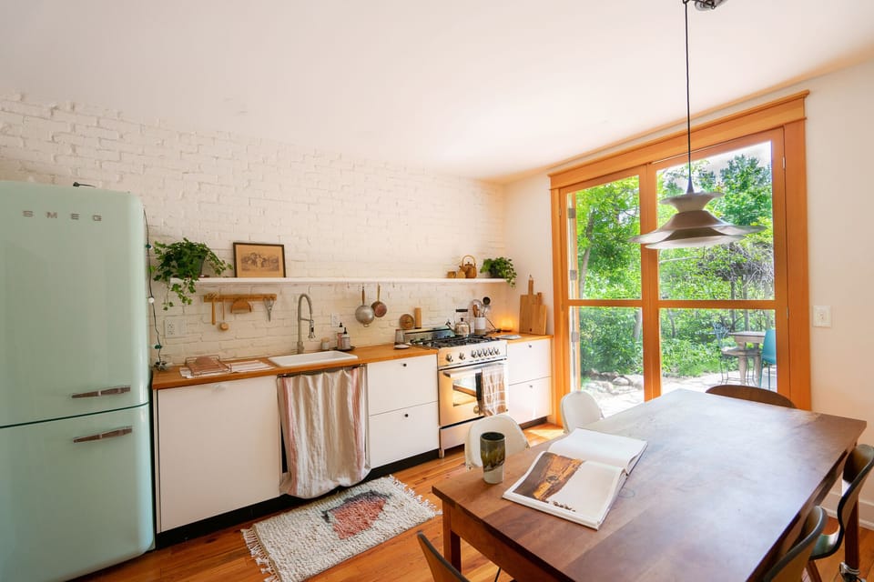 Gorgeous light filled kitchen with French doors to private garden