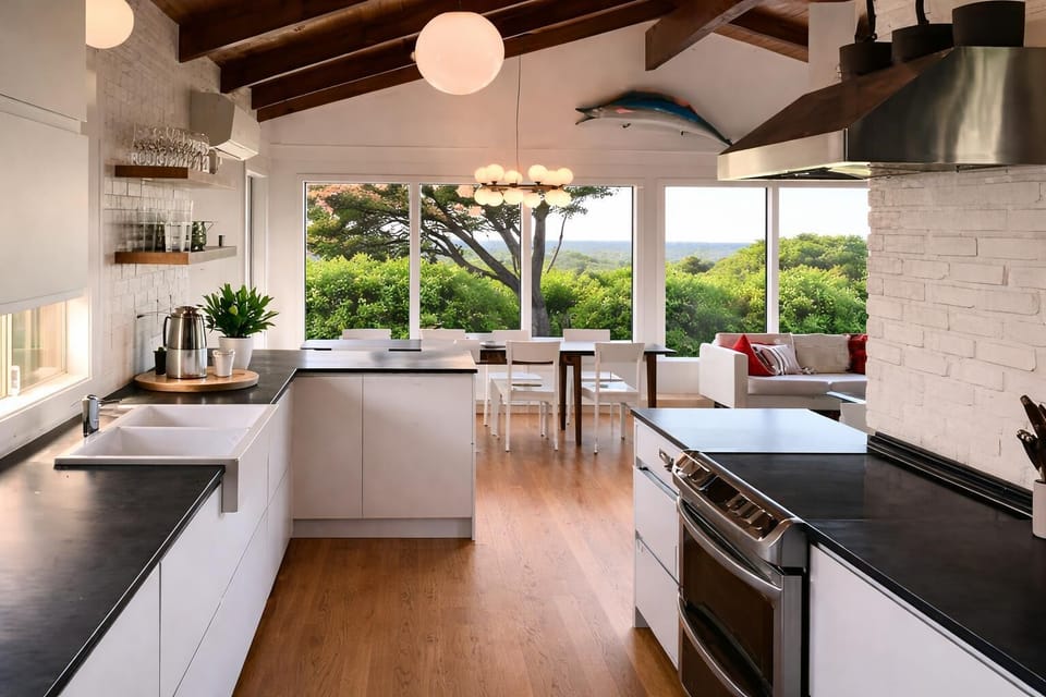 Sunlit kitchen with scenic views and modern comforts