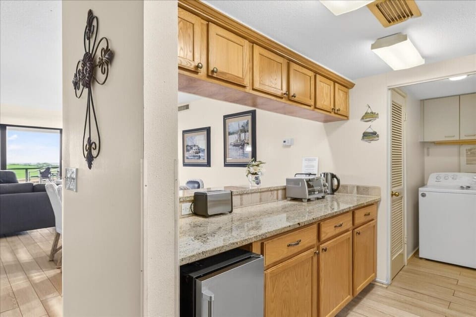 Breakfast/Serving Bar & Convenient Laundry Closet