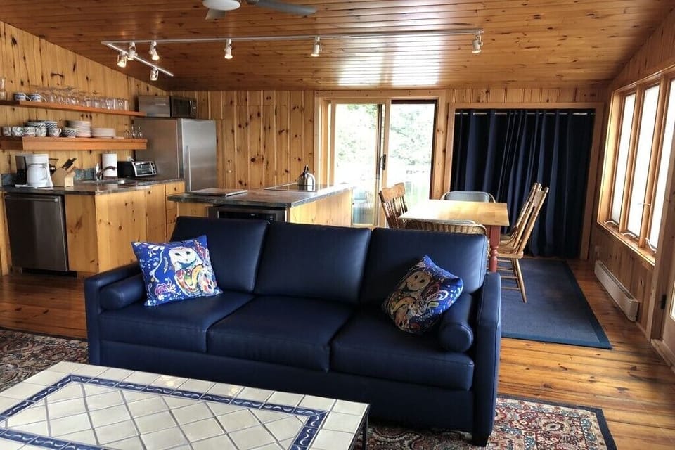 living, dining and kitchen large boathouse