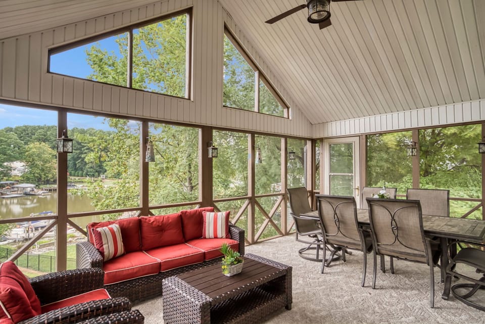 Screened in porch with outdoor dining
