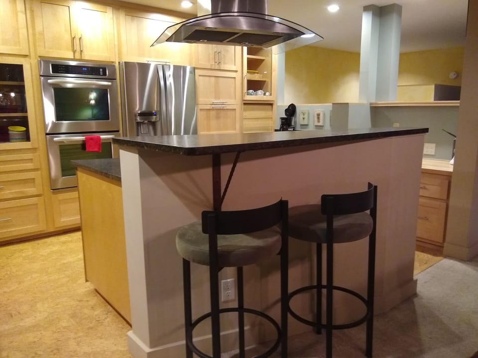 Gourmet kitchen, breakfast counter with stools