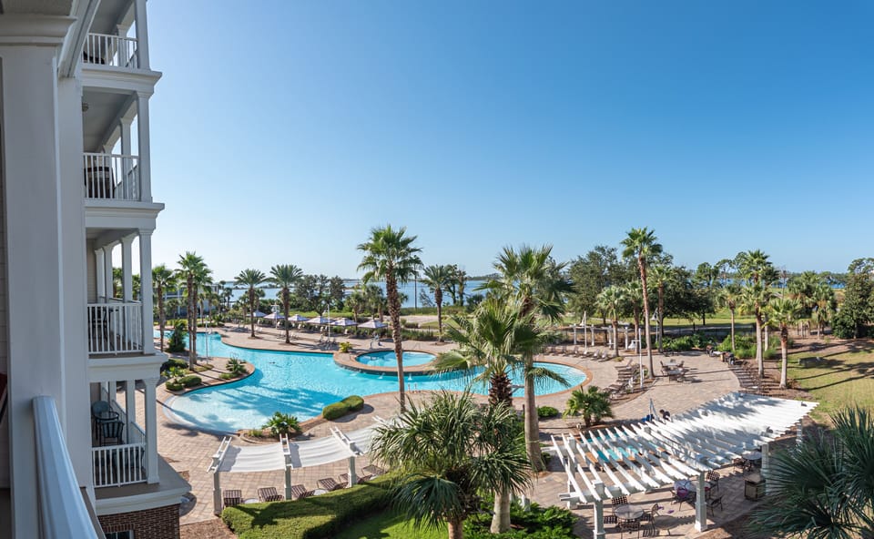 View from balcony of resort pool and Upper Grand Lagoon
