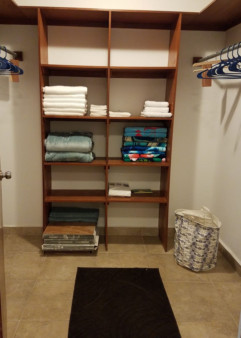 Enormous walk in closet, hamper for your convenience.