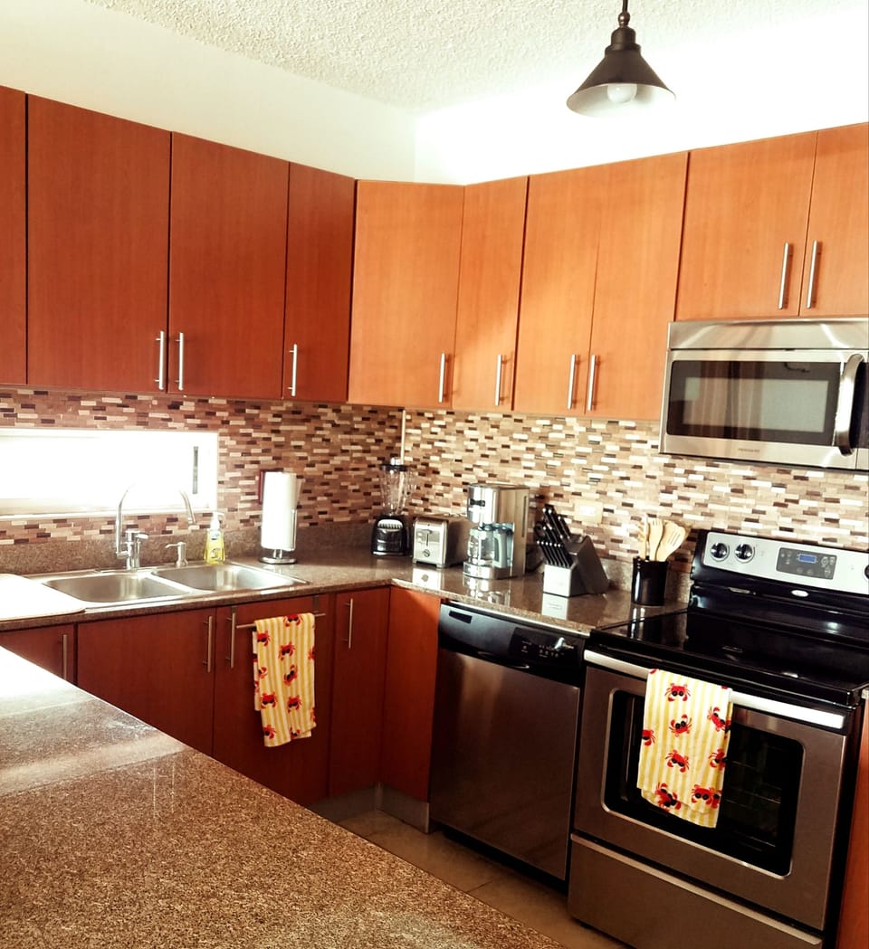 Modern kitchen with everything you may need.