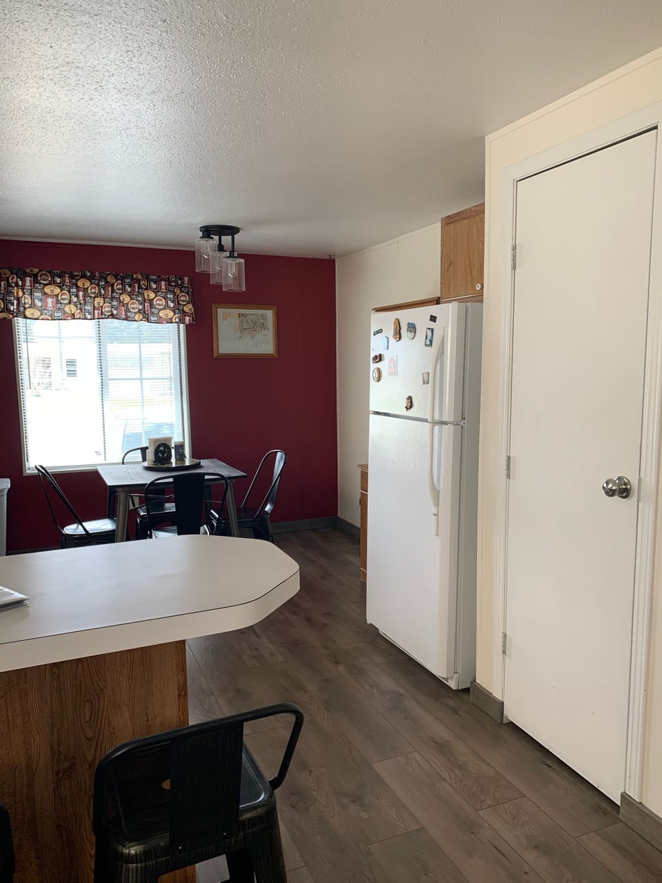 Entry closet and kitchen area 