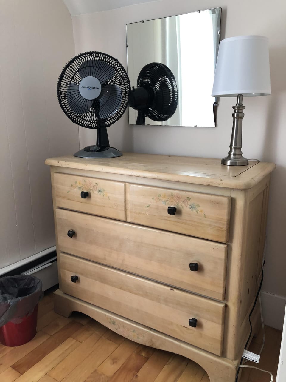 Dresser in room with twin bunks