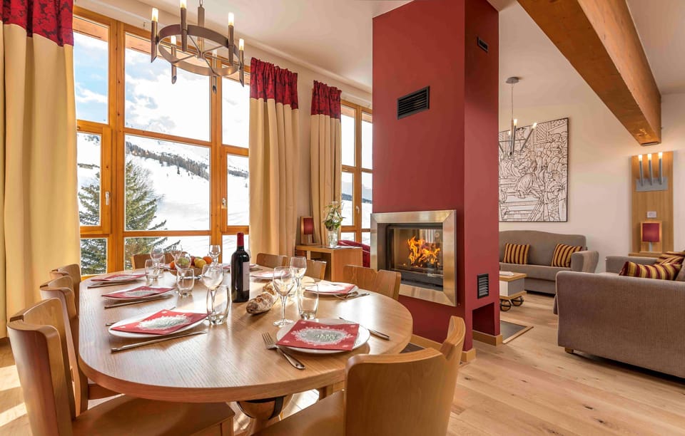 Relax in front of the fireplace. Please note that photos are representative and the layout may vary between units.
