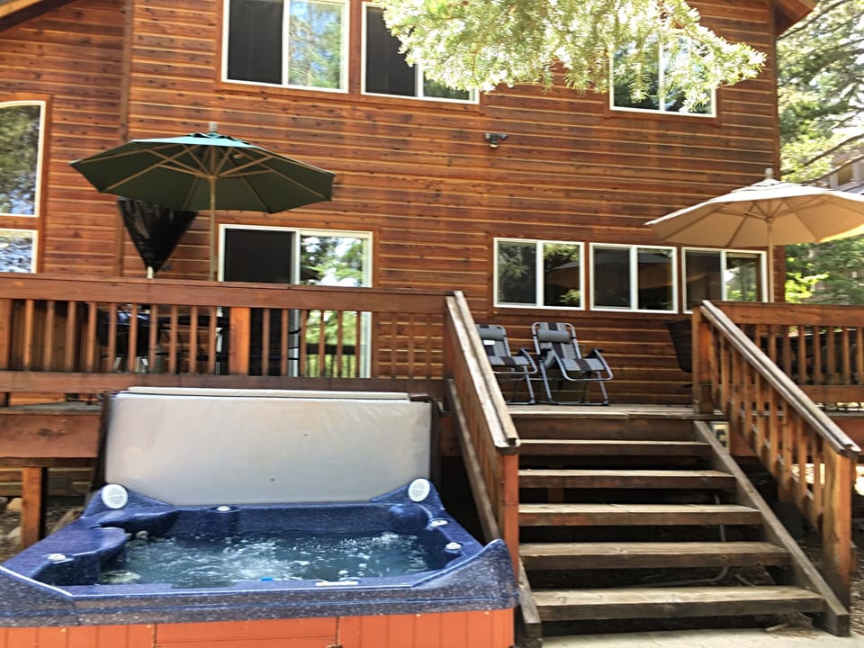 Hot tub adjacent to deck