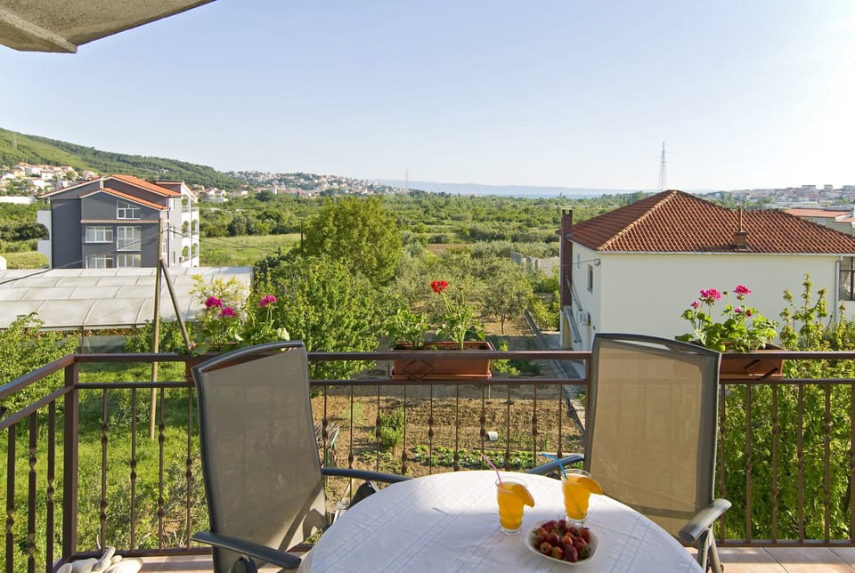 This is balcony with table and 5 chairs. Balcony was 20m2. 