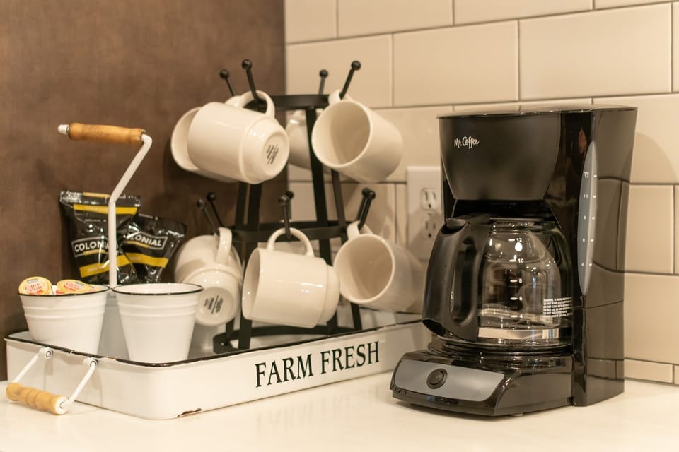 Coffeemaker and coffee supplies at the ready ~ The Rooftop