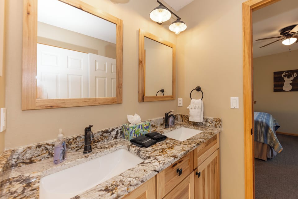 Bath 2 (separate access doors from both Bedrooms 2 and 3)