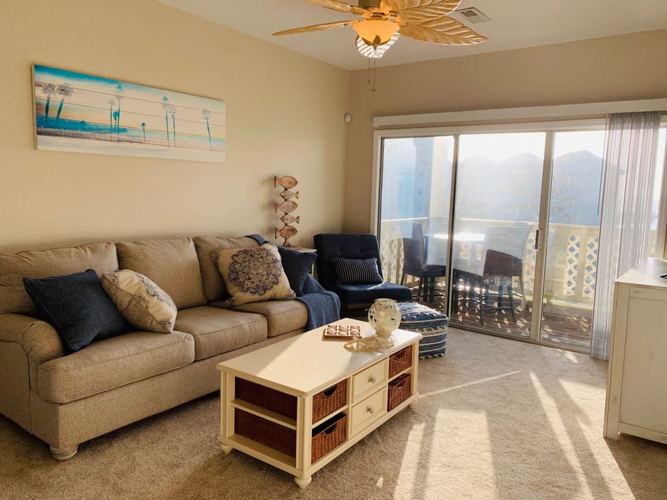 Living room with queen sleeper sofa.